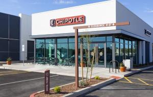 Chipotle exterior of a restaurant with a drive-thru.