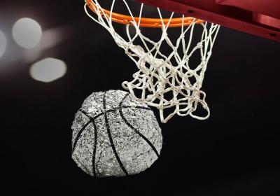 A graphic created by Chipotle showing a silver basketball going through a hoop.