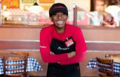 Portillo's Hot Dogs smiling employee.