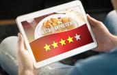Restaurant review site on a tablet.